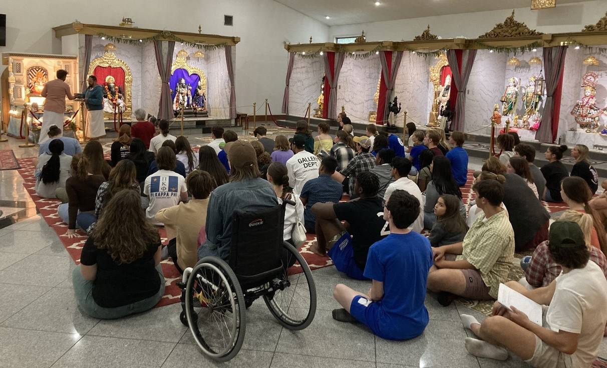 A photo of a puja ceremony in a local hindu temple